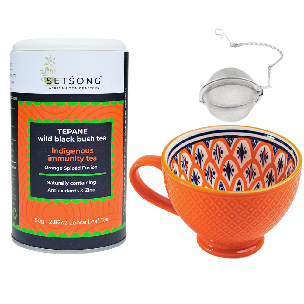 Tea and Tea-cup Gift Box including Tea Strainer.